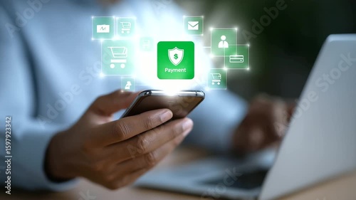 Wallpaper Mural Seamless digital payment interaction using a smartphone and laptop in a modern tech environment. Torontodigital.ca