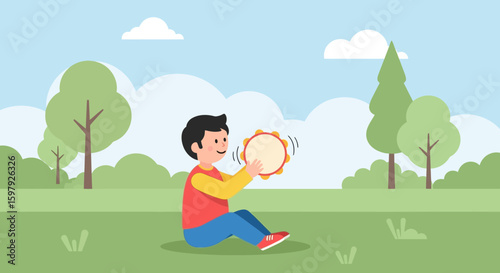 Boy Having Fun Playing Tambourine In The Green Park On A Sunny Day