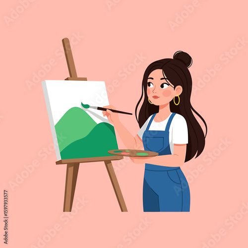 A young woman with dark hair in a bun, wearing overalls, stands painting a green landscape on a canvas propped on an easel. She holds a palette in one hand.