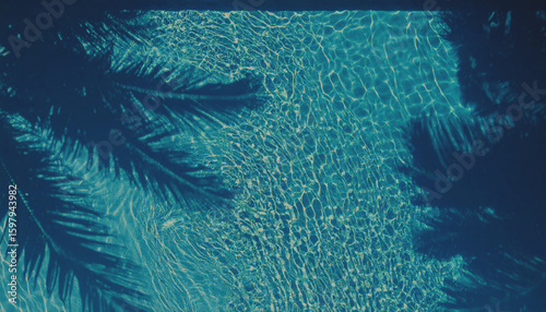 Water surface background in a turquoise blue swimming pool.