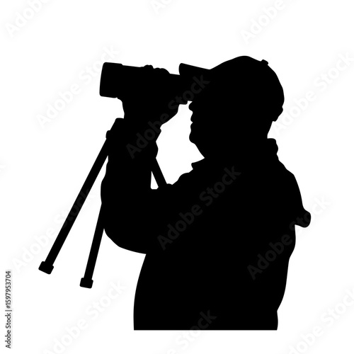 Silhouette of photographer with camera on tripod against white background. Photographer silhouette uses a professional camera with a telephoto lens for capturing images.