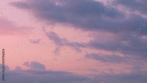 Beautiful Sunset Purple Pink Clouds In Orange Pink Sky In Sunlight Time Lapse, Motion, Amazing Evening Colorful Skyscraper And Fluffy Clouds, Colorful Atmosphere, Sky And Clouds Background.