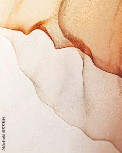 Abstract flowing beige and brown ink texture