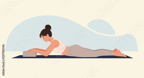 Woman Practicing Restorative Yoga Pose With Block For Chest Opening