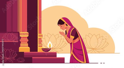 Woman In Traditional Dress Praying Beside A Lit Oil Lamp During Hindu Festival