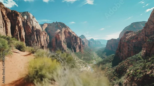 Scenic Mountain Canyon with Rocky Cliffs and Bright Blue Sky in a Natural Adventure Landscape