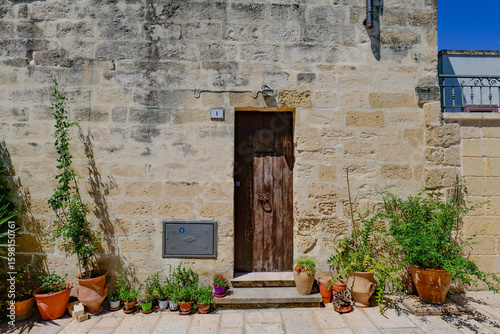 Wallpaper Mural The facade of an old house in Acaya, a medieval town in the province of Lecce, Italy. Torontodigital.ca
