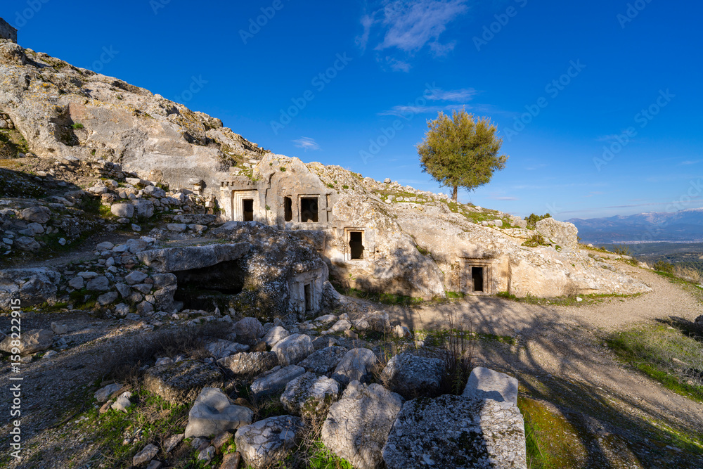Fototapeta premium Tlos was an ancient Lycian city near the modern town of Seydikemer in the Mugla Province of southern Turkey, some 4 kilometres northwest of Saklikent Gorge. Tlos ancient city and amphitheatre Fethiye