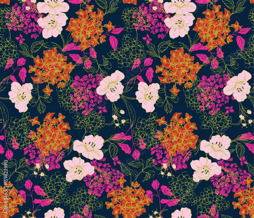Floral seamless textile print with Hydrangea and blossoming flowers in a dark blue background