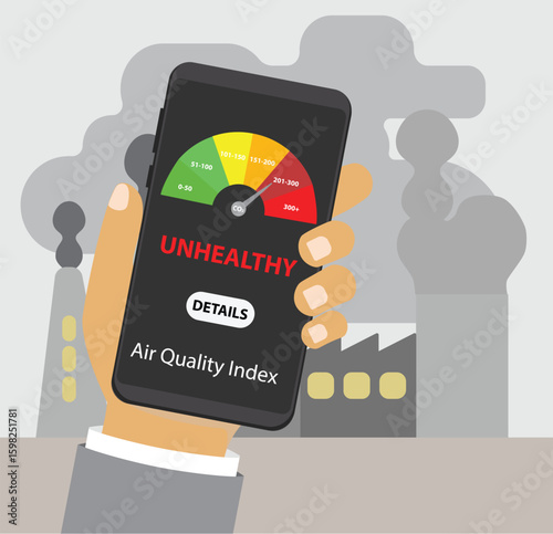 Hand holding smartphone to check air quality index near industrial factory pollution.