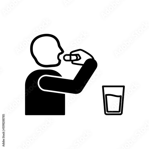 Person taking medication with a glass of water