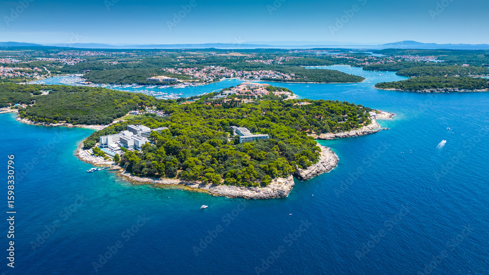 Fototapeta premium Aerial view of Verudela Peninsula near Pula, Croatia – Grand Hotel Brioni, Hawaii Beach, Verudela Canyon and scenic Adriatic coastline