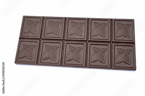 Pieces of dark chocolate. Collection of various dark chocolate pieces isolated on white background