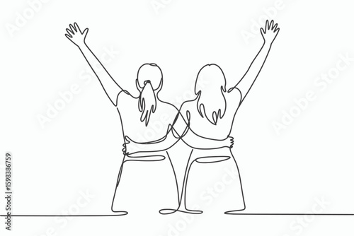 Two friends with arms raised in celebration