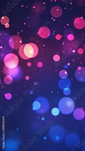 Abstract motion background with vibrant pink and blue bokeh light circles. Festive glitter effect animation footage.