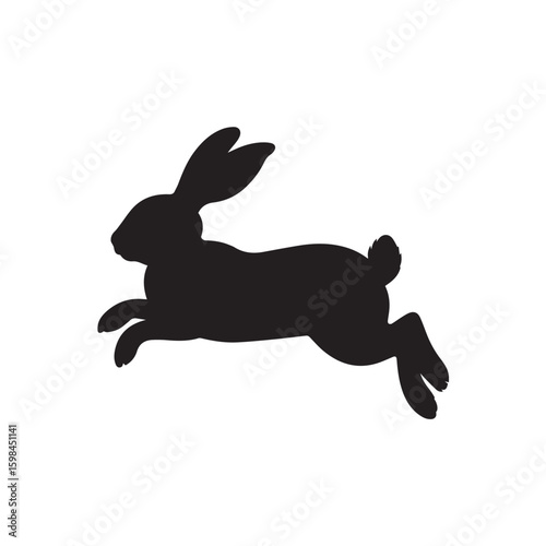 Silhouette of a rabbit jumping with long ears and a fluffy tail