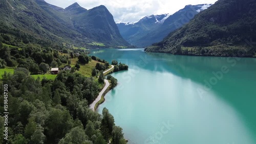 Aerial View of Car Driving Along Oldevatnet Lake in Olden, Norway