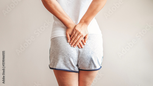 Person with hemorrhoids and constipation