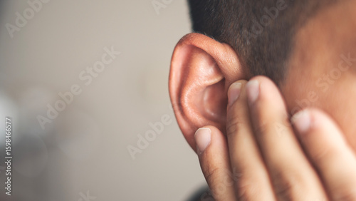 Tableau sur toile Ear pain and clogged ears concept