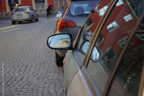 Canvas Print Cars parked on the street
