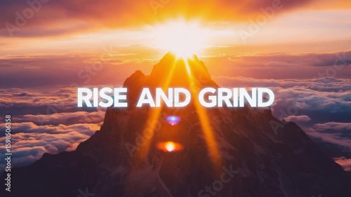 A stunning sunrise over a mountain peak, casting warm light across the clouds. The scene evokes a sense of motivation and new beginnings.