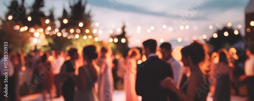 Outdoor Wedding Celebration with Dancing Guests Under String Lights at Dusk – Blurred Background Event Photography