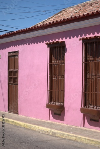 Sometimes modern and thriving, sometimes rural and colonial, houses made from the same land still prevail, as well as the modern use of concrete.
