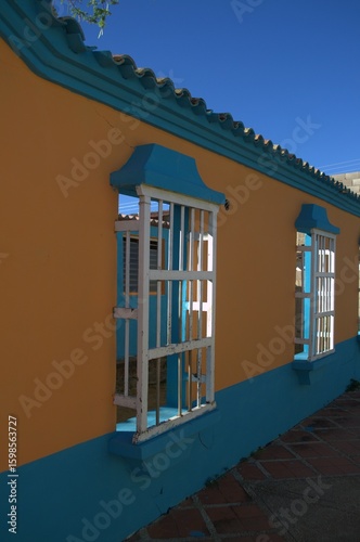Sometimes modern and thriving, sometimes rural and colonial, houses made from the same land still prevail, as well as the modern use of concrete.