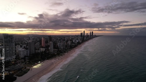 Sunset 4k drone view of Gold Coast, Australia during a beautiful golden hour.  