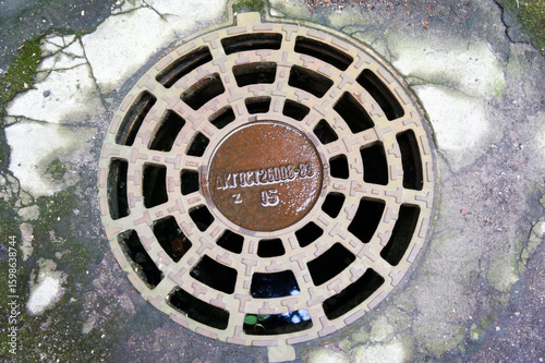 Metal round hatch with numbers.