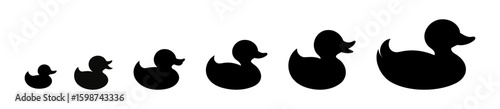 Set of black silhouettes of rubber ducks in varying sizes isolated on a white background. Bath toy duck icons. Concept of minimalism, bath toys, simple design. Print, icons, design elements