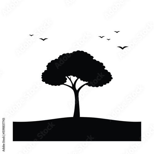 A solitary tree stands in a vast open field with birds soaring towards it