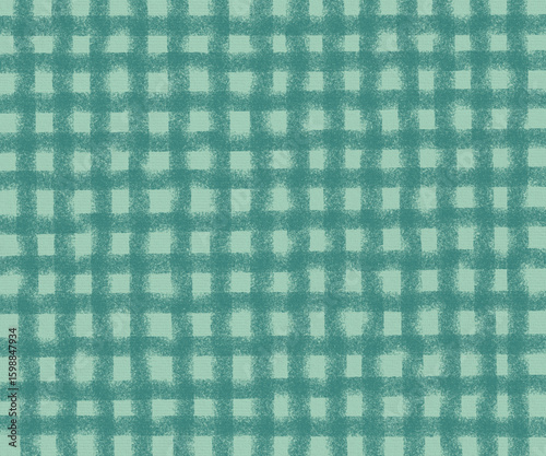 Green plaid fabric texture with a vintage checkered pattern, perfect for a picnic blanket or textile design backdrop