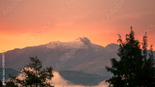 Sunset over the Guagua Pichincha Volcano in the Andes.