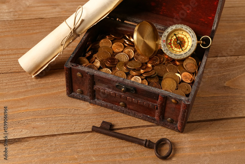 Old chest with coins, compa...