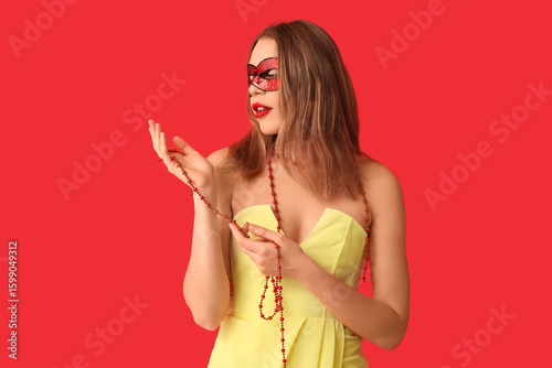 Beautiful young woman in re...