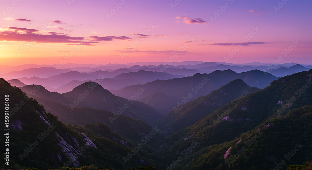 Fototapeta premium Mountain Range Sunset with Purple Sky, Evoking Mystery
