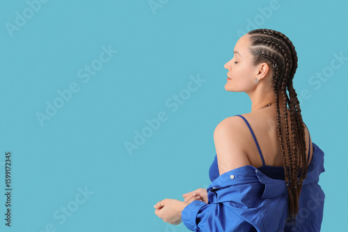 Stylish young woman in shir...