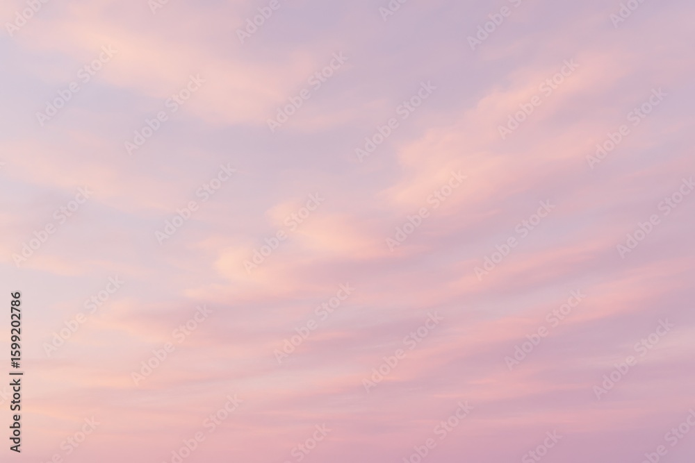 Fototapeta premium Dreamy pastel sky with soft cloud formations creating serene and peaceful atmospheric background in gentle color palette