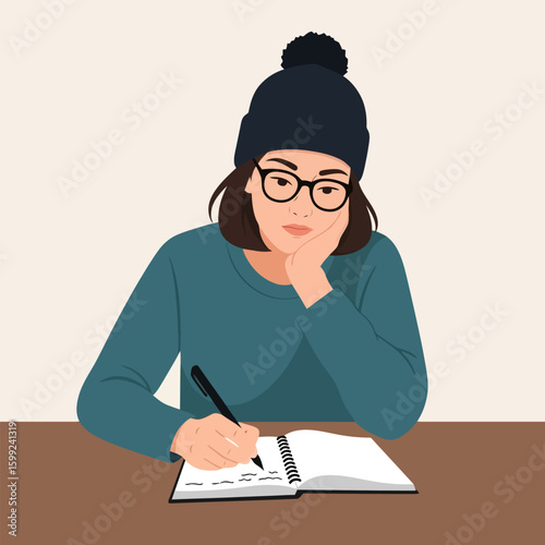 Pensive Woman Writing in Notebook with Pen Wearing Black Hat