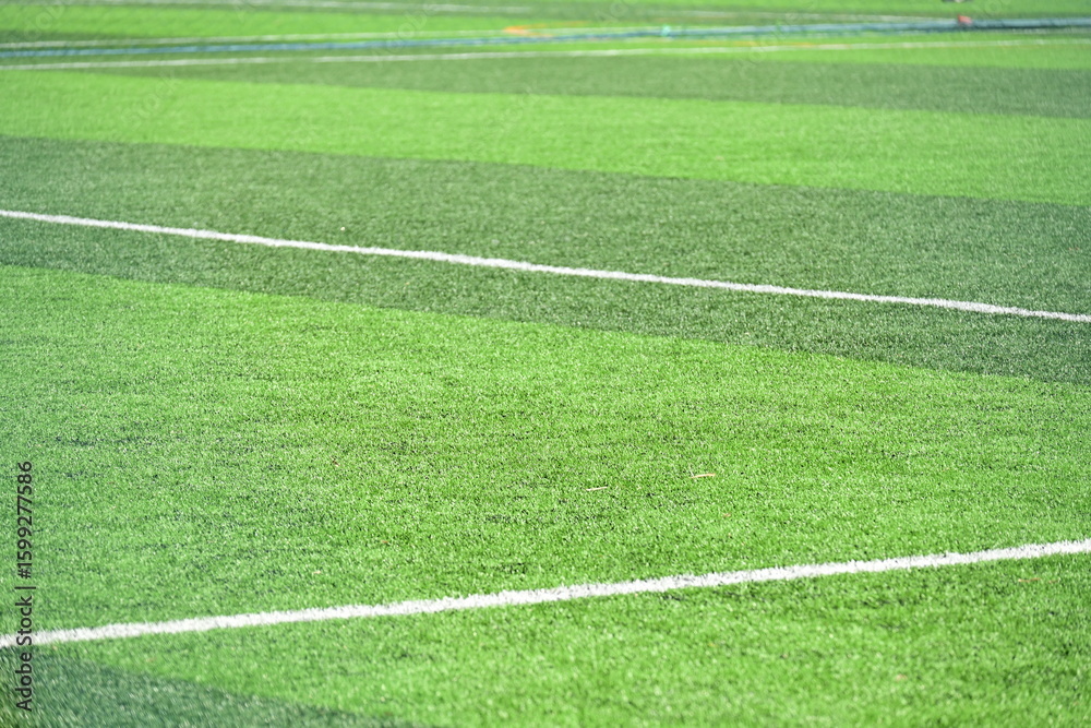 Obraz premium artificial green grass background for playground