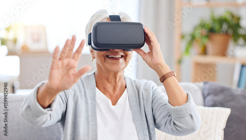 Senior woman using VR headset at home. (1)