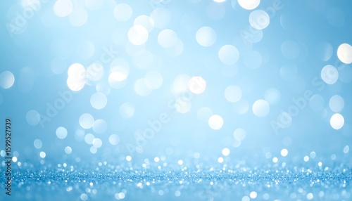 Light blue bokeh background with glitter