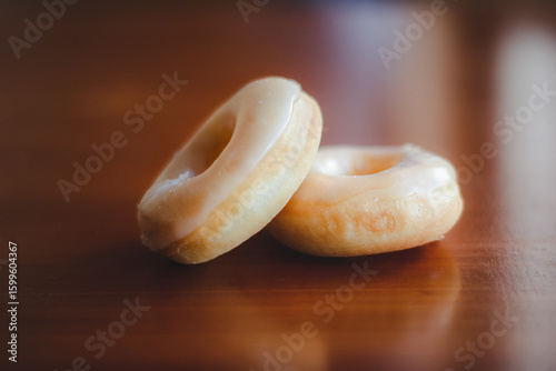 Two mini donuts on a table