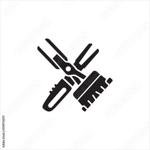 Crossed barber tools featuring clippers and scissors