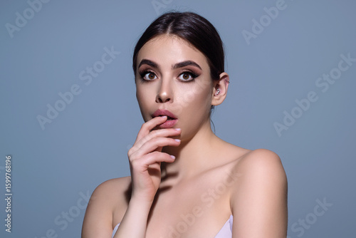 Photography Emotional student girl shocked with news covering mouth with hands