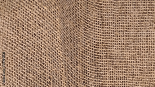 Jute hessian sackcloth woven organic burlap, hemp flax texture pattern background in light beige brown color. Jute pattern, rough burlap texture, canvas coarse cloth