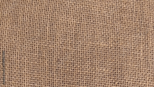 Jute hessian sackcloth woven organic burlap, hemp flax texture pattern background in light cream brown beige brown color 