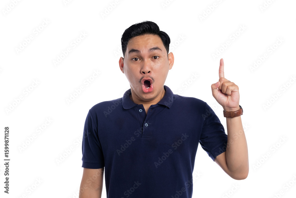 Fototapeta premium Surprised Asian man pointing upward with excited facial expression as if having a great idea isolated on transparent background