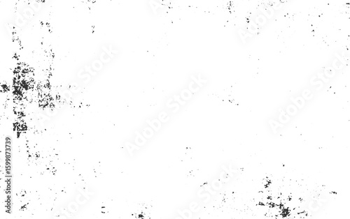 Black speckles and smudges on white background abstract grunge